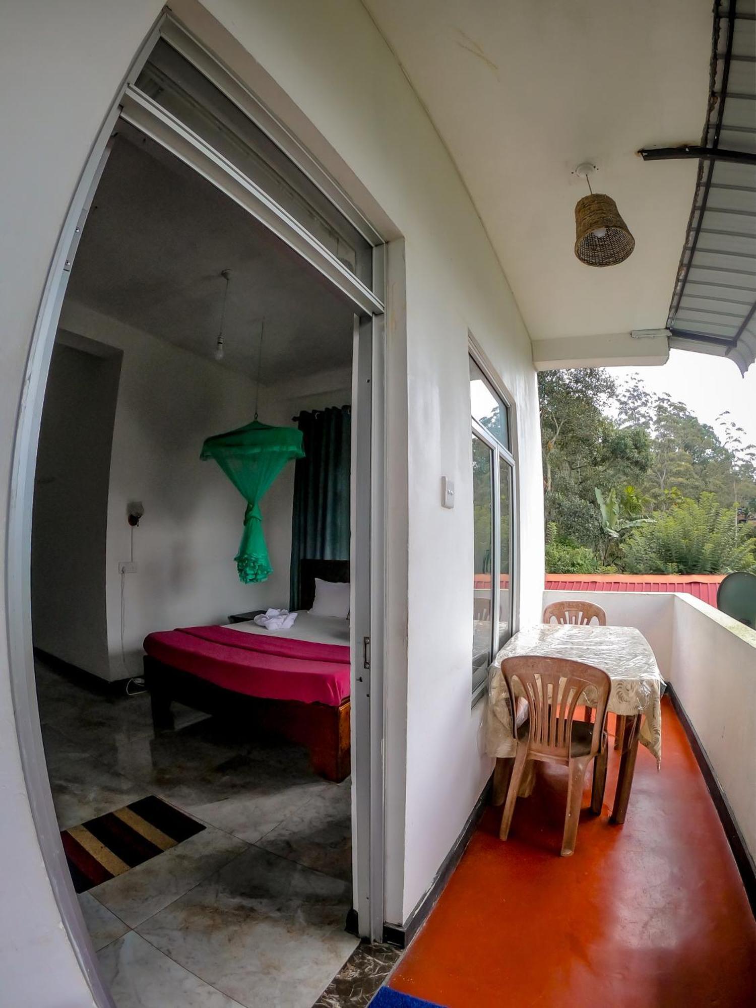 9 Arch View Rest Inn Ella Bagian luar foto