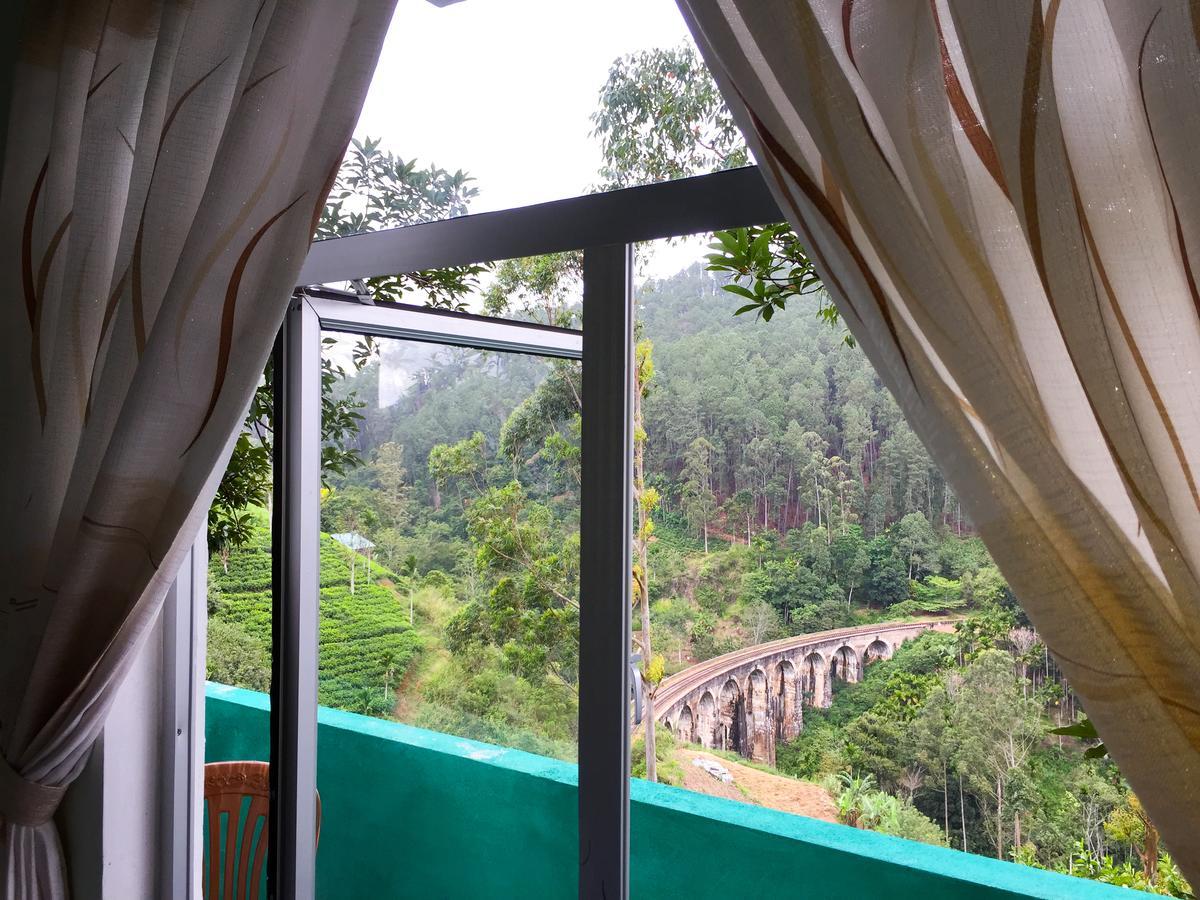 9 Arch View Rest Inn Ella Bagian luar foto